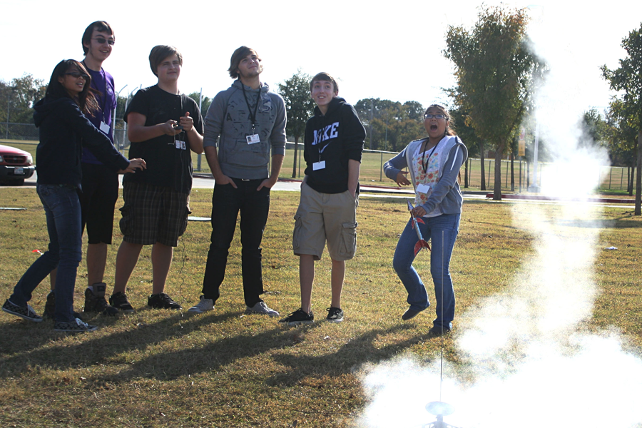 Physics students launch rockets for a lab in Mr. Davis class.