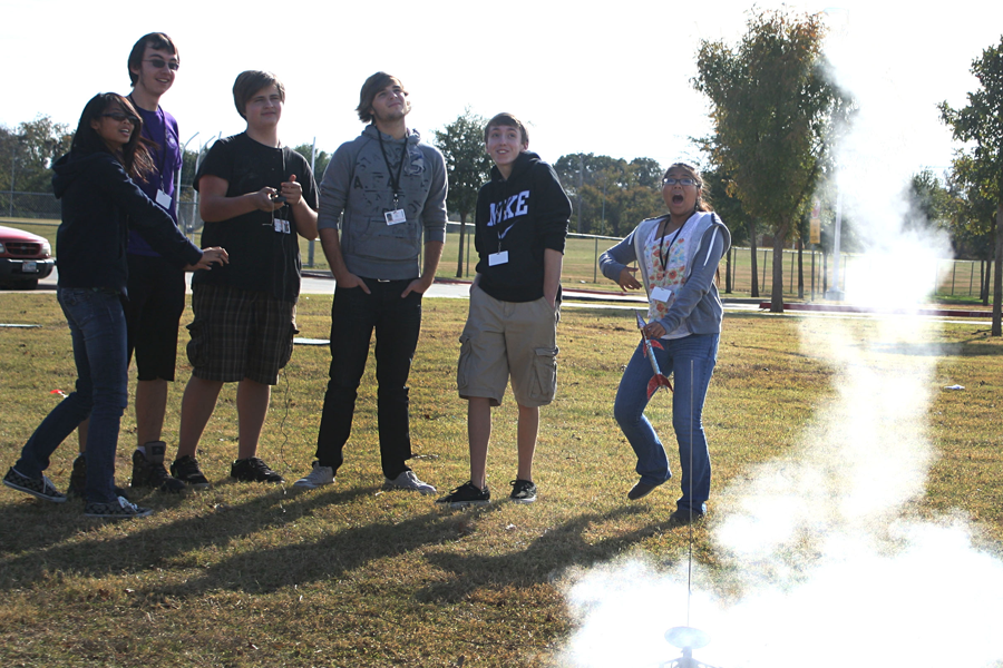 Physics students launch rockets for a lab in Mr. Davis' class.