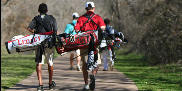 Golf members walk to their next hole during a tournament last season.