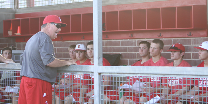 Coach David Walden talks to the team before practice on March 4.