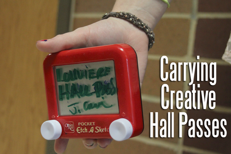 Mrs. Louviere uses an Etch-a-Sketch for a hall pass.