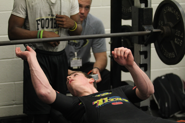 Brennan Morrell, 12, prepares himself to begin a lift at a competition. 