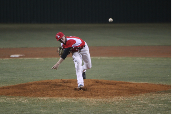 Cole Hearrean, 12, pitches against Summit High School on March 25.