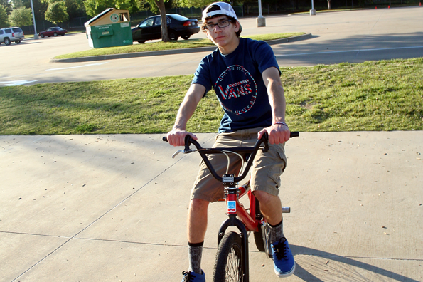 Aubrey Valenzuela, 10, rides his BMX bike after school.