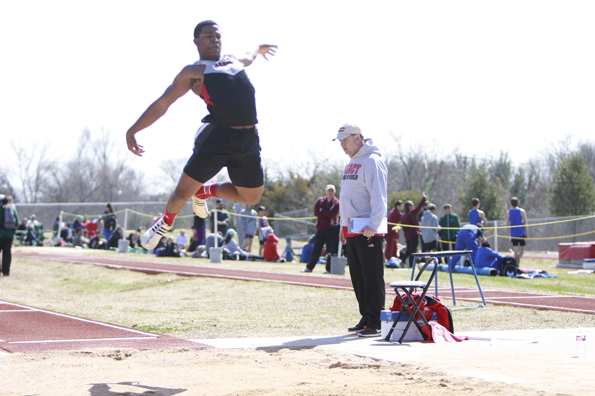 Kenton Mayberry, 12, competes in long jump to secure his spot in state. 
