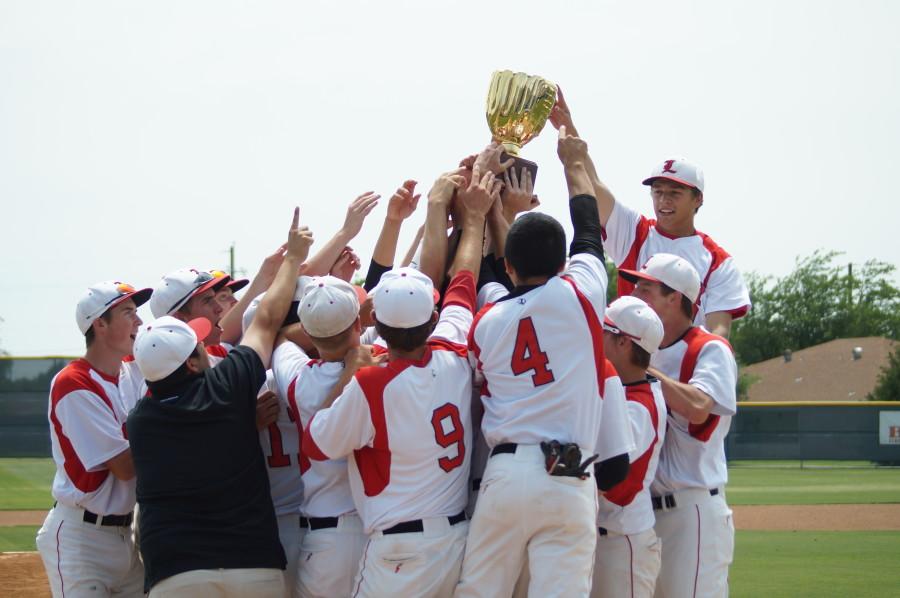 After winning the Regional Quarter Final round of playoffs, the varsity baseball team celebrates. The team plays Prosper High School at DBU May 22, 23, 2014 in the next round of the playoffs.