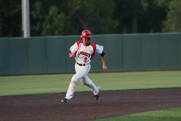 Sam Mahofski, 12, rounding second base.