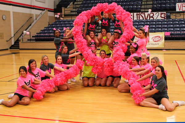 Cheerleaders create a cancer ribbon for last years PinkFest.