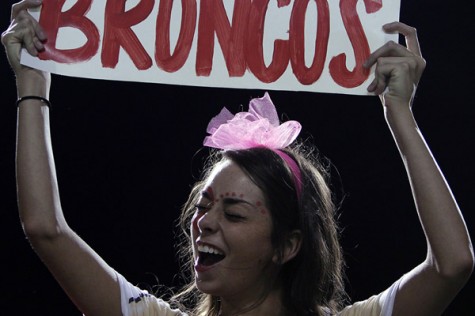 Lindsay Lucero, 12, cheers for the broncos at the pink fest game. (Maddy Brown photo)