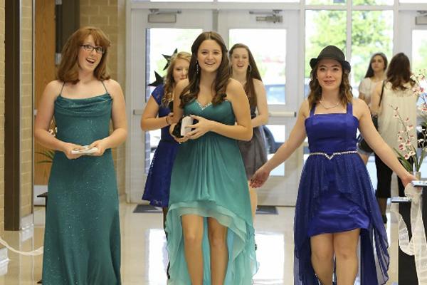 Sarah Haslam (right) made her own dress for the band banquet. 