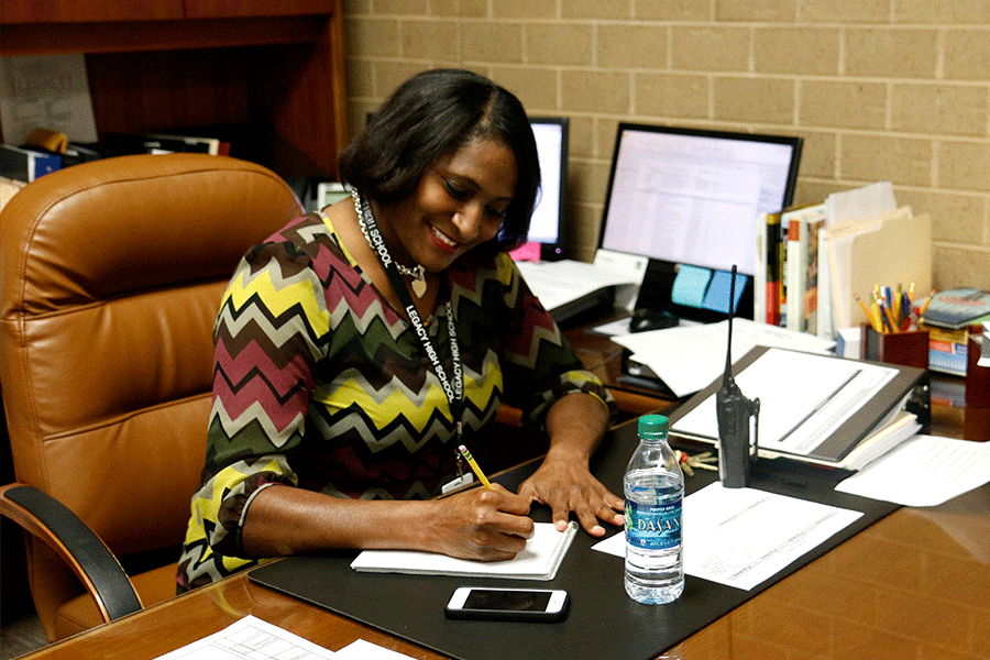 Dr. Butler working at her desk.