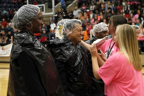 Assistant Principal Mr. Contreras prepares to receive a cream pie in his face at a LUCK Week pep rally on March 6.
