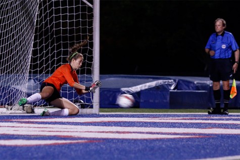 Kyleigh Hall, 10, makes the game winning save at Legacys playoff game against Red Oak April 7.
