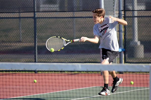 Zachary Carpenter, 9, hits a forehand stroke during tennis practice on Feb. 5. (Megan Bell photo) 