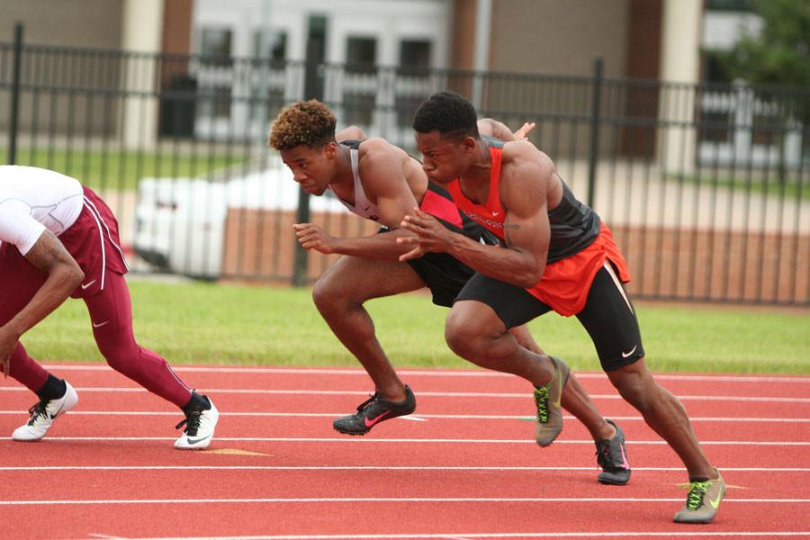 Jared McGee, 11, runs in the relay at the area track meet.