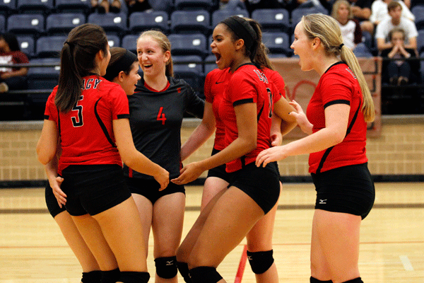 Shelby Stewart, 12, cheers with her teammates after scoring on Red Oak. The Varsity girls won 3 out of 5 matches and will play again Tuesday, Sept 8 at Summit at 6:30. (Maddy Brown photo)