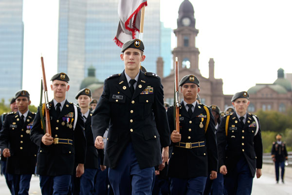 Caelan Rios, 12, leads JROTC as they march down a Veterans Day parade in Downtown Fort Worth on Nov. 11. (Tapanga Perrin photo)