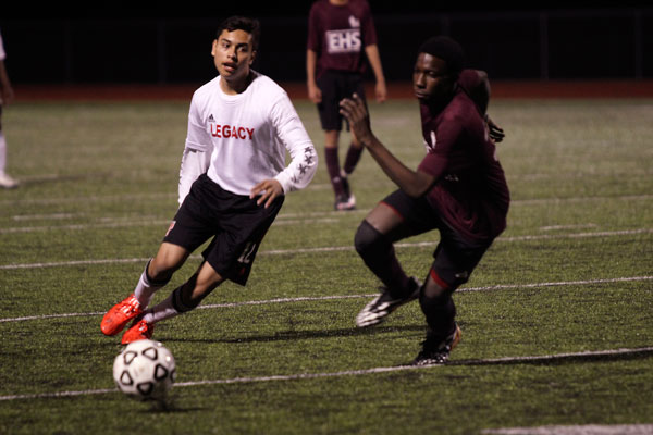 Andrew Murillo, 10, kicks the ball around an opponent on Jan. 15 at the Legacy vs. Ennis game. (Aisha DeBurr photo) 