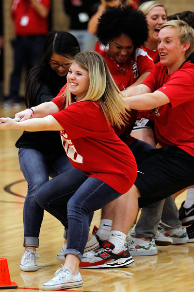 Haley Wells, 12, competes in a Junior vs. Senior tug-of-war competition on Jan. 29 at the Red Out Winter Sport pep-rally, (Maddy Brown photo)