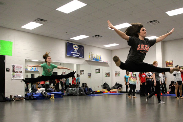 Madison Geise, 11, practices a Russian jump on Jan. 8 in dance class. (Megan Bell photo)