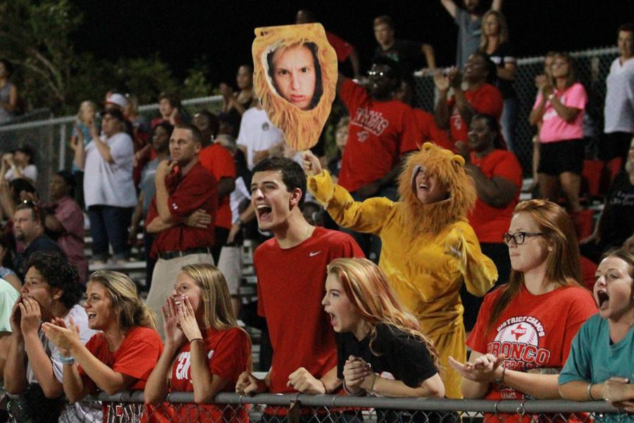 Cooper Keeney, 12, cheers on the football team during the Legacy vs Lovejoy game. 