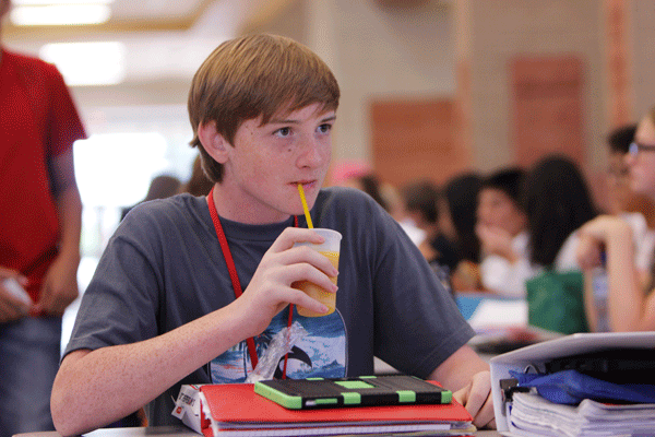 Nick Willingham, 9, drinks a V8 Smoothie during lunch.