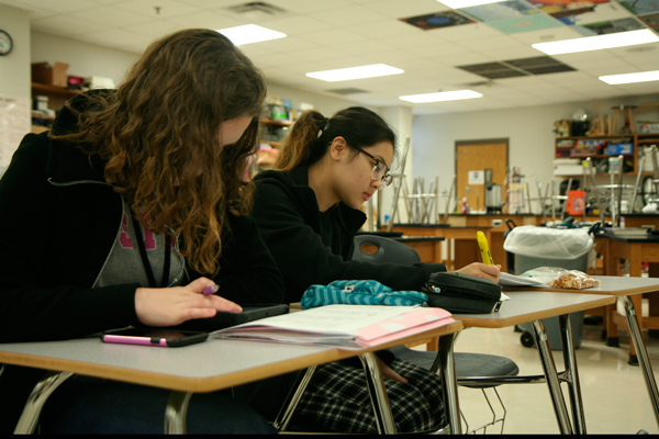 Acadec students study for an upcoming competition.