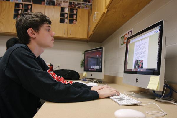 Senior Jacob Friedberg works on articles for TheRiderOnline. 