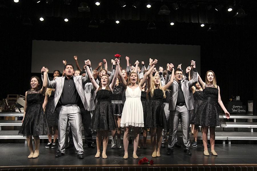 Show choir students rehearse before their upcoming show.