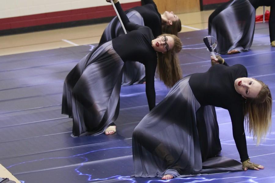 Color+Guard+performers+practices+their+routine.