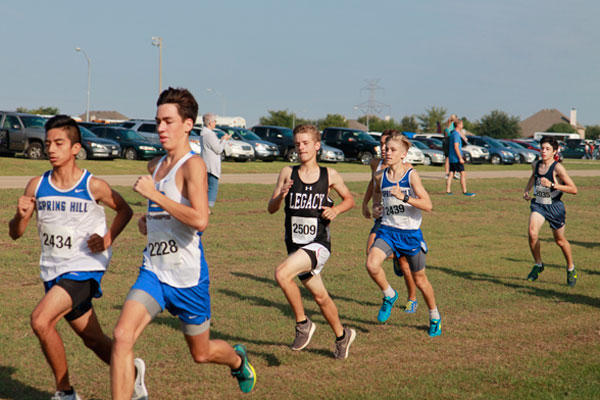 Cade Logan competes in the DBU University Patriot Cross Country Meet on September 9.