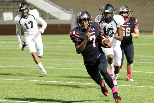 Kendall Catalon #7, 12, rushes for a touchdown against the Lake Ridge Eagles. 