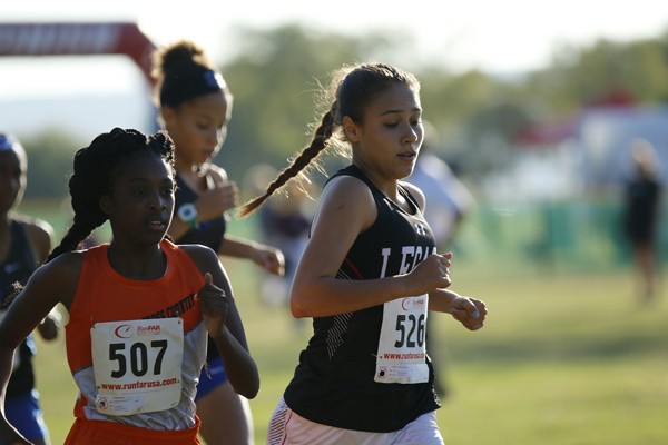 Catherine Richardson, 12, runs in a cross country meet. 