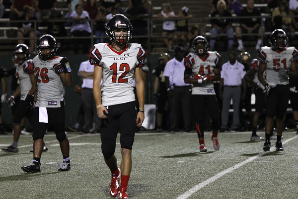 Brandon Bosecker, 12, breaks up a pass and gets ready for the next play.