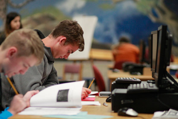 Senior Josh Hogue takes one of seven tests at the Summit High School District Invitational on Dec. 2. 