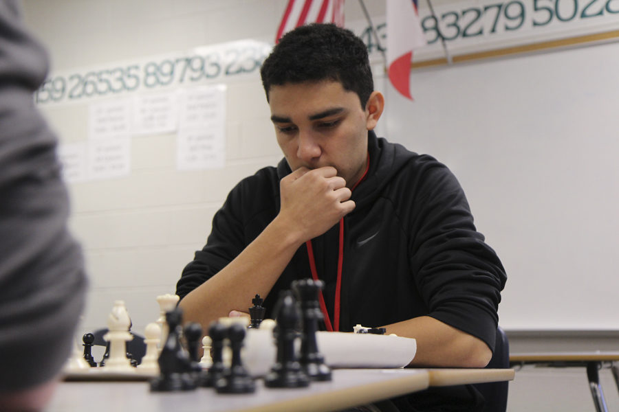 Senior Francisco Rodriguez plays chess after school in Ms. Sara Kamphaus classroom. Chess club meets every Friday after school in Ms. Kamphaus classroom. 