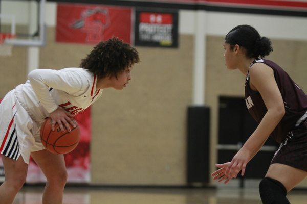 Cyliest Smith, 11, triple-threats in a home district game against Red Oak on Jan. 20.