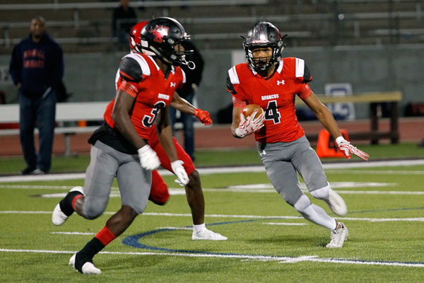 Ja Dyn Ishmael, 11, runs the football down the field during the Round 2 playoff game against Dallas Kimball on Nov. 24. Legacy won the game, 66-7, and will play North Forney on Dec. 2 at 2:00 at Allen Eagle Stadium. (Tori Greene photo)