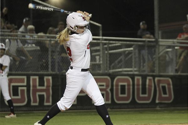 Sarah Turner, 12, hits the ball in a home district game against Lake Ridge.