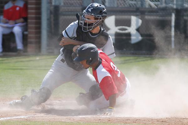 Cameron Fisher, 12, slides into a base. Varsity Baseball will face Red Oak on April 28. 
