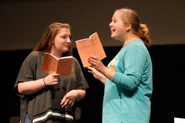 Kinsley Stuart-Browne, 10, and Kathryn Pedroza, 11, rehearse for the fall play, "Faith County" in the PAC. 