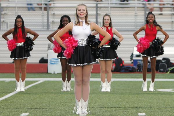 Abby Walker, 12, performs at a football game. 