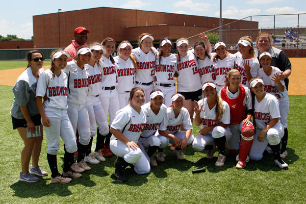 Legacy+softball+poses+for+a+picture+after+defeating+Burleson+Centennial+10-5.+The+Broncos+won+the+third+game%2C+advancing+to+the+next+round+of+playoffs.+