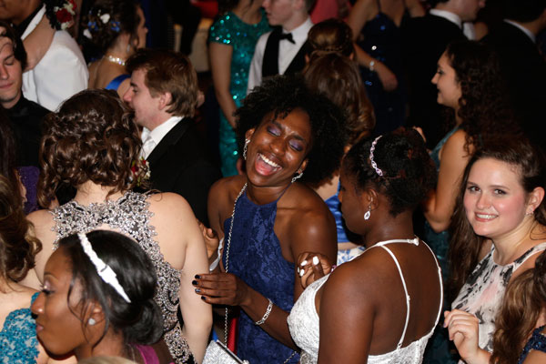 Keyona Thomas, 12, dances with friends at Legacys senior prom. 