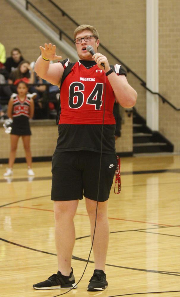 Clayton Franks, 12, speaks to the students about coming out to support the football team at the game. Varsity played Wichita Falls and won. (Yibran Franco Photo)