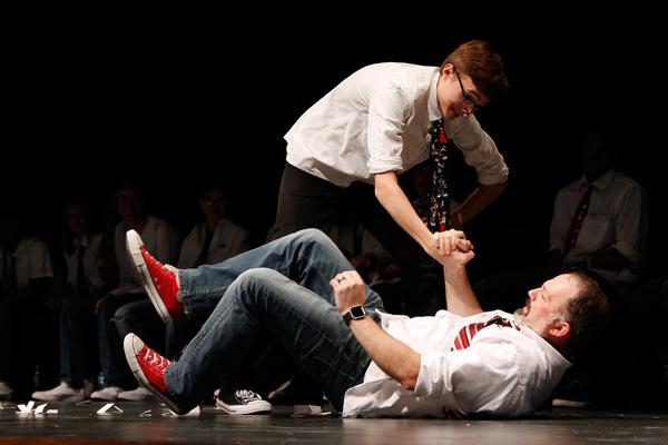 Ben Schnuck performs on stage with Mr. Jeremy Ferman during the Improv show.
