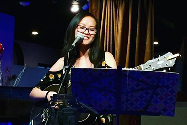 JenniLee Johnson, 10, performs at a restaurant during one of her monthly gigs.