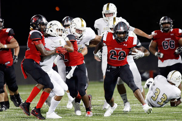 Senior Grant Johnson carries the ball against Wichita Falls Rider.