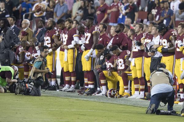 The staff reflects on whether or not NFL players have the right to kneel. 