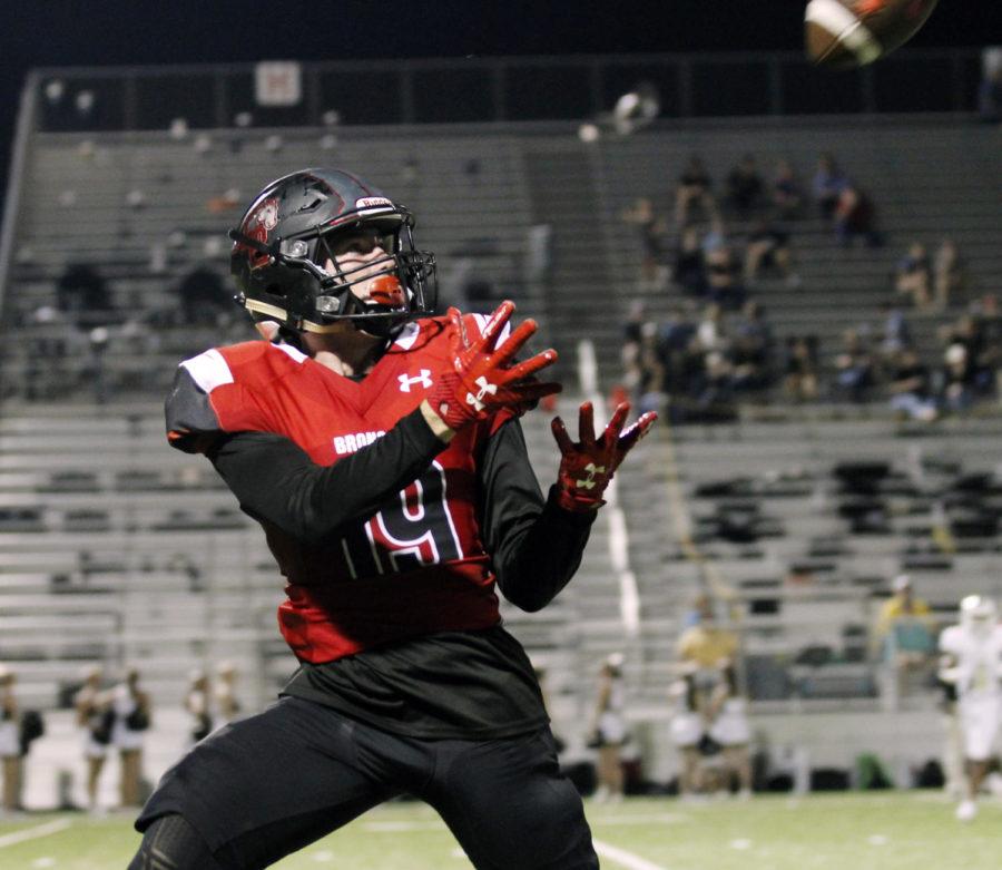 Junior Nathan Rooney receives a pass during the game against Wichita Falls on Friday, Sept. 1.